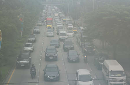 BANGKOK, THAILAND - SEPTEMBER 20, 2016: Photo of the air pollution and smoke from cars and motorcycles in Bangkok city on September 20, 2016 in Bangkok, Thailandのeditorial素材