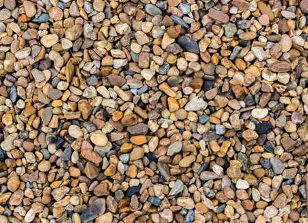Abstract background and texture of colorful pebble in the landscape gardening. Colorful gravel...