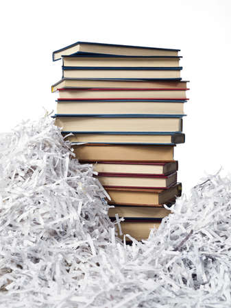 pile of books between the strips of paperの写真素材