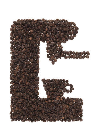 form a coffee machine  made of coffee beans on the white backgroundの写真素材