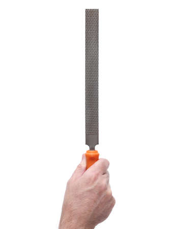 hand of man holding a rasp isolated on the white backgroundの写真素材