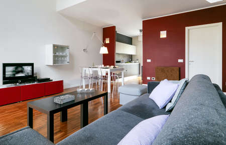 interior view of modern living room overlooking on kitchenの写真素材