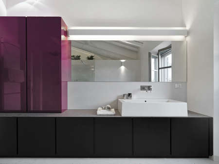 interior view of modern bathroom in foreground the washbasinの写真素材