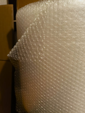 plastic wrap in the box as a background, closeup of photo