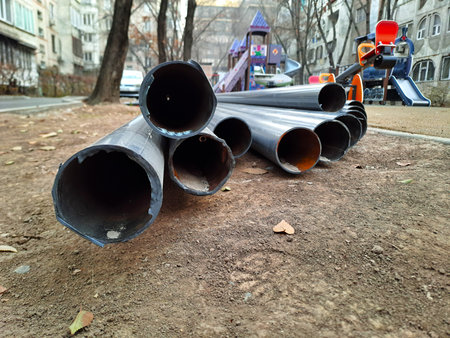 Stack of Large Metal Pipes for Construction or Utility Use