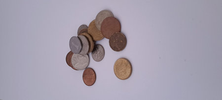 Coins of different countries on a white background. Money concept.の写真素材