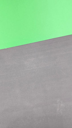 Minimalist abstract background with green and dark gray horizontal splitの写真素材