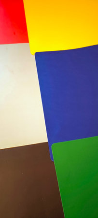 Colored sheets of paper as a background, closeup of photo