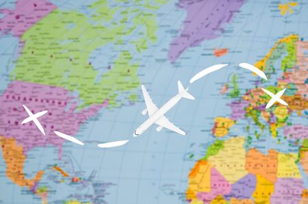 Flight to the USA symbolic image of travel by plane map.の写真素材