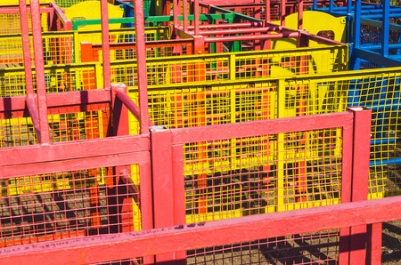 Multicolored metallic maze mesh fence, for abstract background textureの写真素材