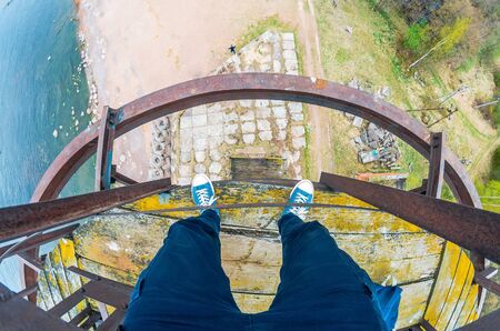 View from the top of the tower of the foot, height on the coast of the bayの写真素材
