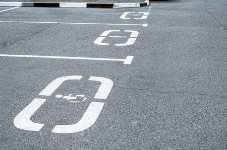 Parking for cars, places for the disabled, sign on the asphaltの写真素材