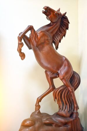 Wooden statue of a horse from mahogany.の写真素材