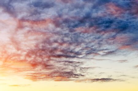 Sky clouds sunset, textured colored clouds skyの写真素材