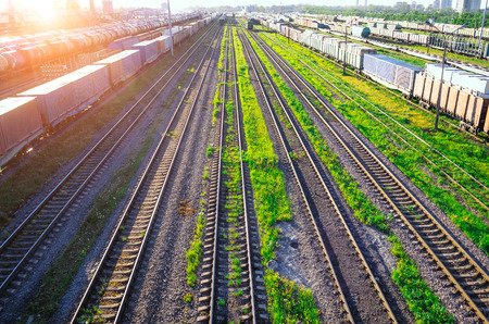 Railway at the marshalling yard sunset, freight train railway carriageの写真素材