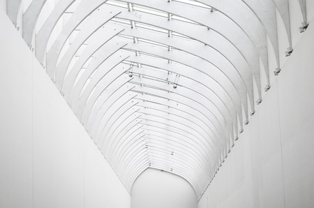 White arch of steel and glass, view far perspectiveの写真素材