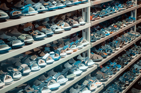 Shop kid shoes, shelves. Russia, Saint-Petersburg. June 2017.のeditorial素材