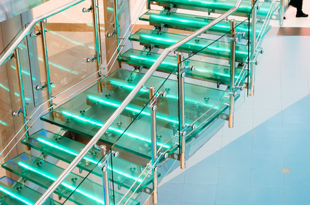 Metal glass staircase with neon, led backlightの写真素材