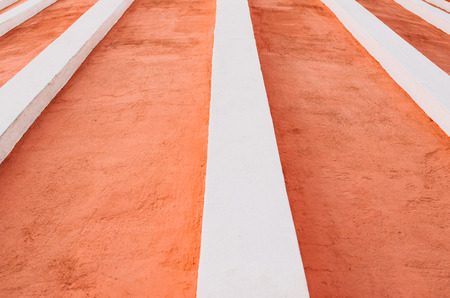 White stripes elements of architecture on a red wallの写真素材