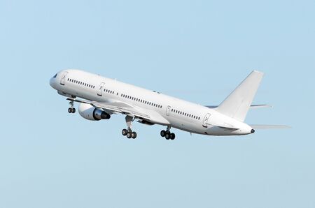 The airplane climbs hight flight cloud skyの写真素材