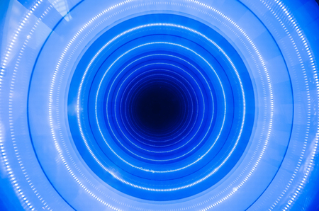 A blue hole is a well, illuminated. Abstract circleの写真素材