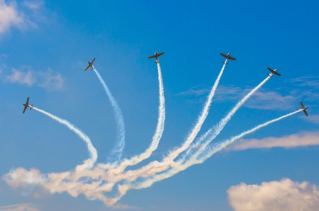 Aircraft fighter jets smoke the background of sky cloudsの写真素材