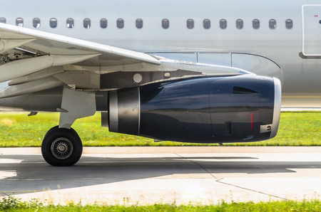 Aircraft engine on the runway before take off at the airportの写真素材