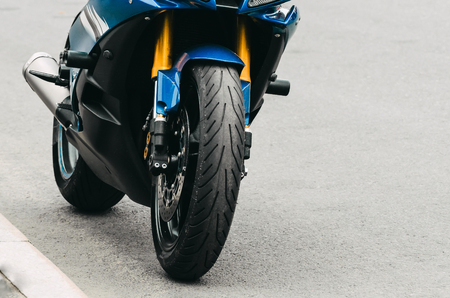 Motorcycle parked street on the asphalt road