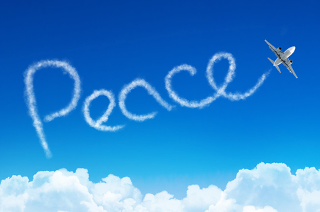 Peace - inscription in the sky left by airplaneの写真素材