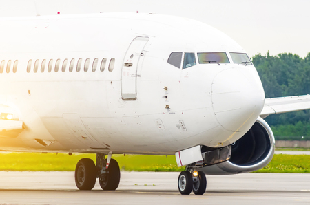 Nose of the passenger and the cockpit of the pilot, airplane close upの写真素材