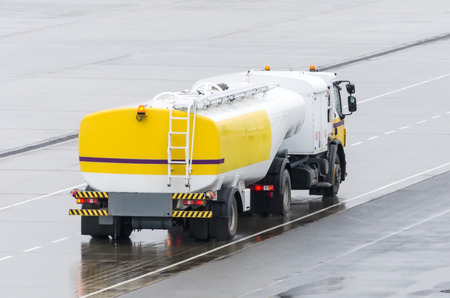 Truck With Fuel Tank On Highway, metal fuel tankers shipping fuelの写真素材