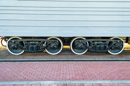 Wheels of a train a carriage, wheels with a white rimの写真素材