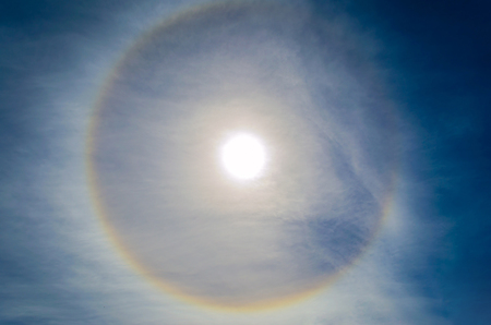 Fantastic beautiful sun halo phenomenon,or the sun with circular rainbowの写真素材