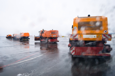 Snow removing machine, on roads cleaning snowの写真素材