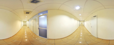 Spherical 360 degrees panorama projection, panorama in interior empty long corridor with doors and entrances to different roomsの写真素材