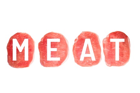 Four pieces of pork meat and the word, in white letters - meat, isolated on white backgroundの写真素材