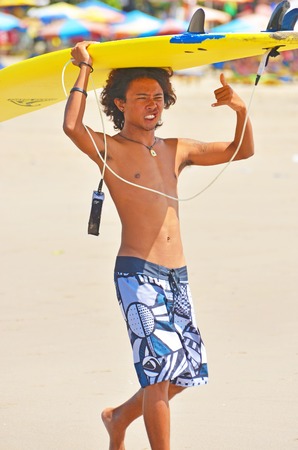 Surfer in green blue in the ocean wave, surfing. Indonesia, Bali, 10 November 2011のeditorial素材