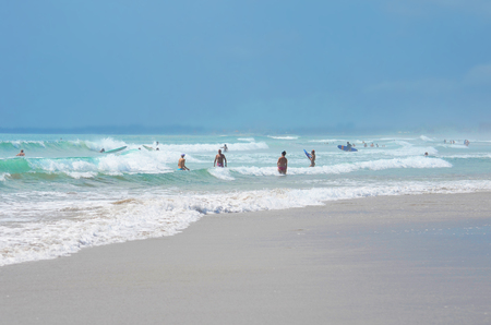 Surfer in green blue in the ocean wave, surfing. Indonesia, Bali, 10 November 2011のeditorial素材