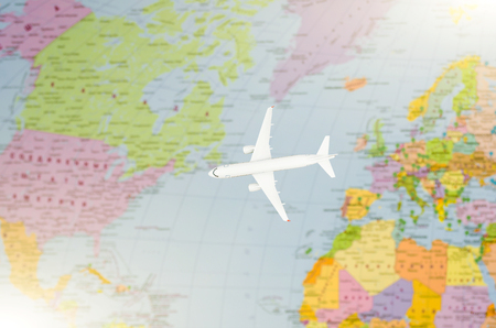 Flight to the USA symbolic image of travel by plane map.の写真素材
