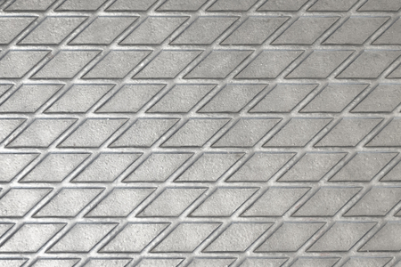 Metallic texture of a reelf shiny diamond color squares of lines intersectingの写真素材