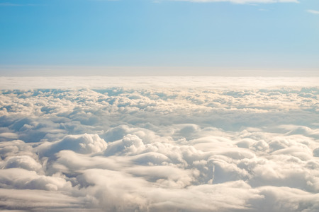 Panorama sky from altitude in the cumulus and layered stratus clouds
