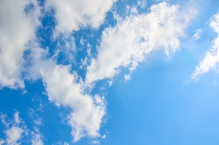 Blue sky with white summer cumulus cloudsの写真素材