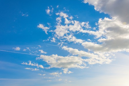 Blue sky with white summer cumulus cloudsの写真素材