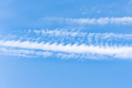 clouds wavy on blue skyの写真素材