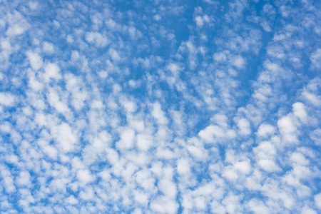 Cloudscape with altocumulus clouds at sunny dayの写真素材