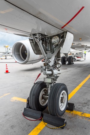 Front landing gear of big passenger aircraft closeup high detailed viewの写真素材