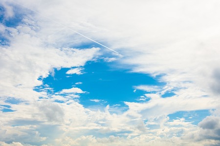 The blue sky in the thick cloud after the rainの写真素材