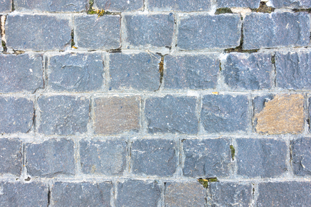 Ancient paving stone dark large stones textureの写真素材