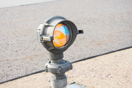 Signal lights on the runway at the airport close upの写真素材