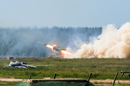 Launching military rockets in the woodlands, war shot defense attackの写真素材